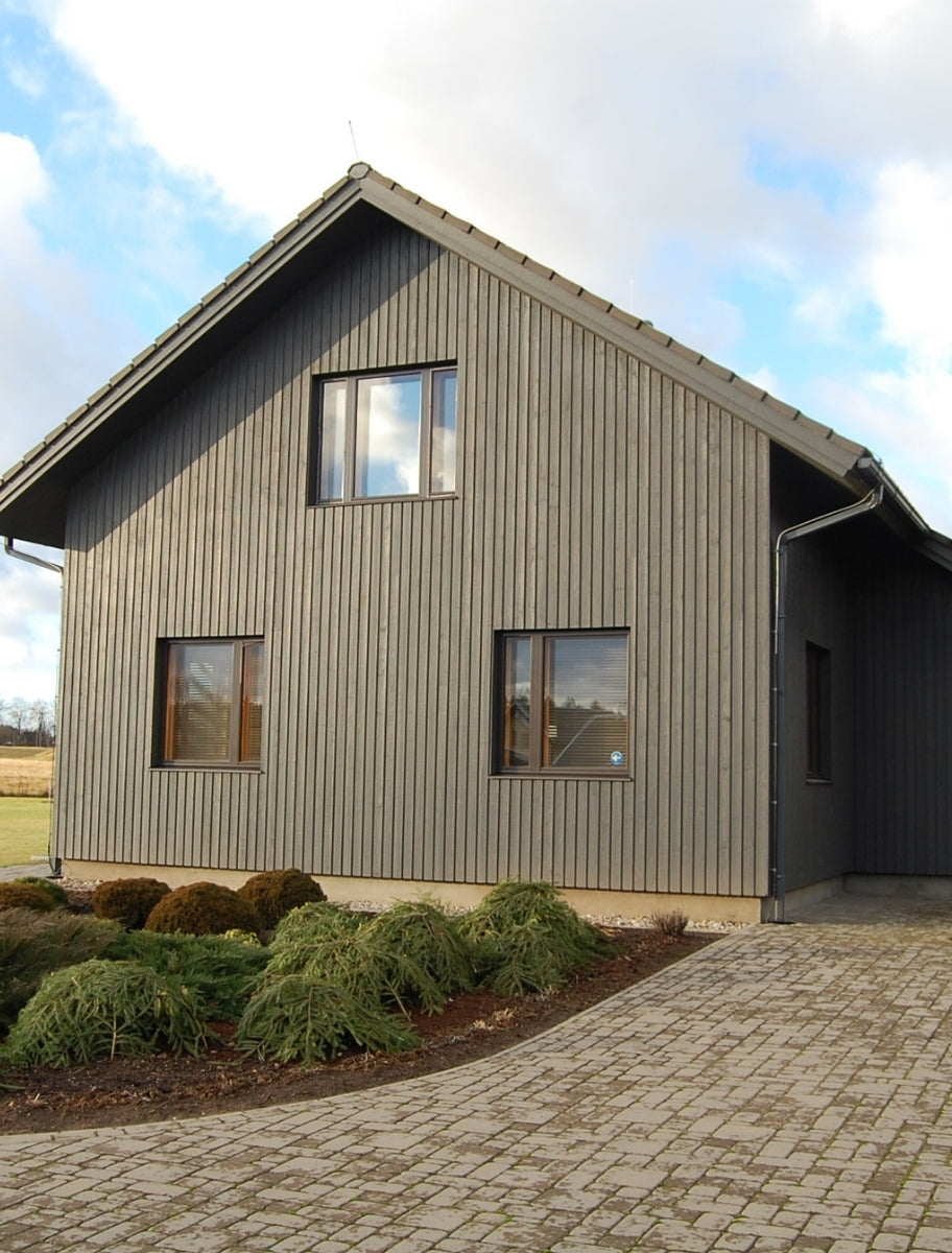 Exterior of a wooden house painted with Paint Eco Natural Paint In Coot shade.