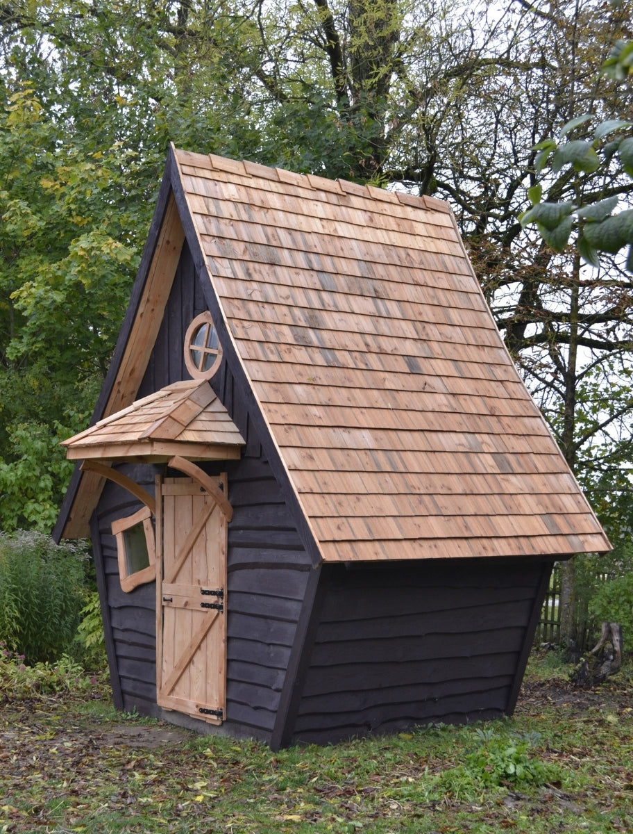 Exterior of a wooden house painted with Paint Eco Natural Paint In Aronia shade.