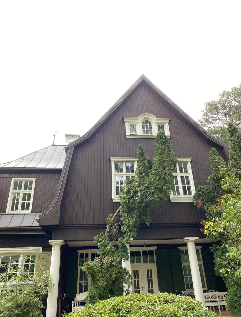 Exterior of a wooden house painted with Paint Eco Natural Paint In Elk shade.