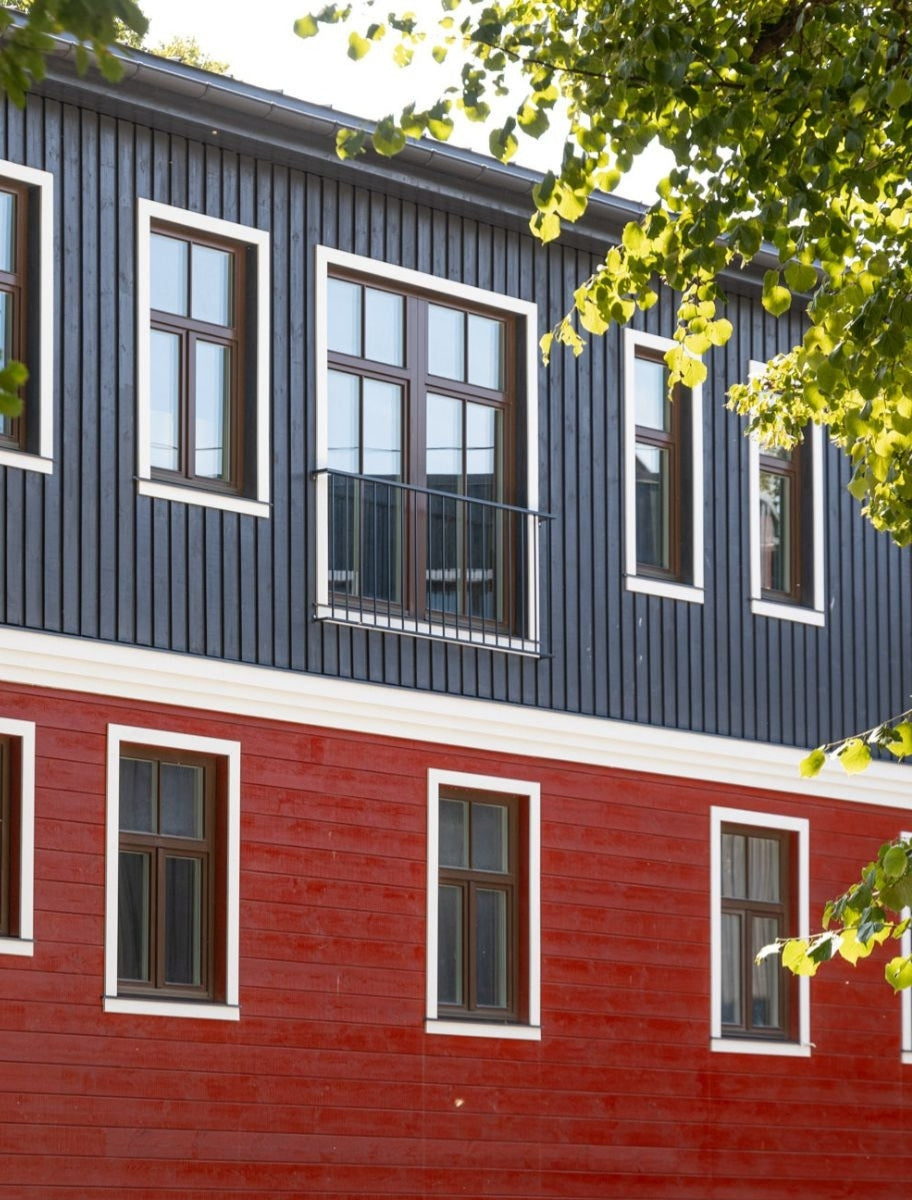 A finished wooden house exterior with PaintEco Linseed Oil Paint.