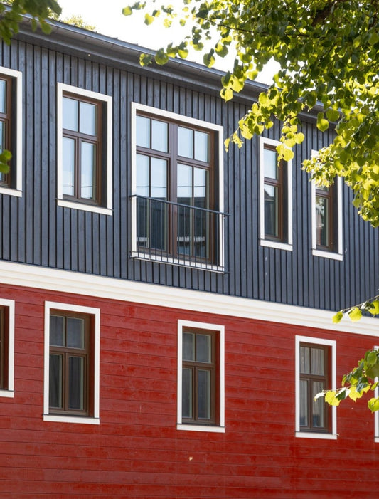 A finished wooden house exterior with PaintEco Linseed Oil Paint.