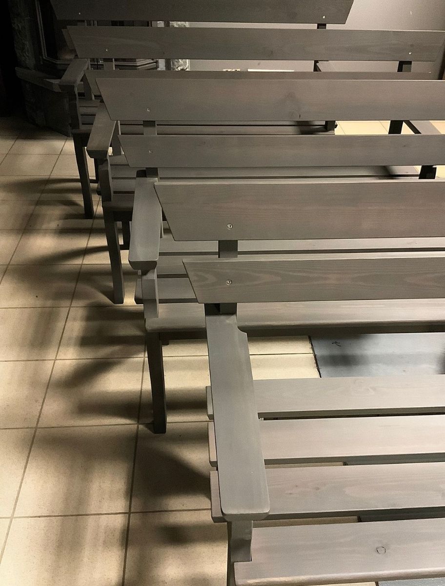 Wooden benches coated with PAINT ECO's terrace stain in an elegant gray shade, providing long-lasting protection and a modern aesthetic for outdoor and indoor use.