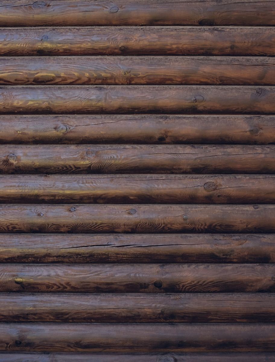 Wood slats treated with PAINT ECO Tar Oil, showcasing deep natural color and enhanced protection.