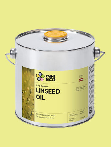 A large metal container of Paint Eco Cold-Pressed Linseed Oil with a yellow label, featuring the product name and an image of linseed plants.