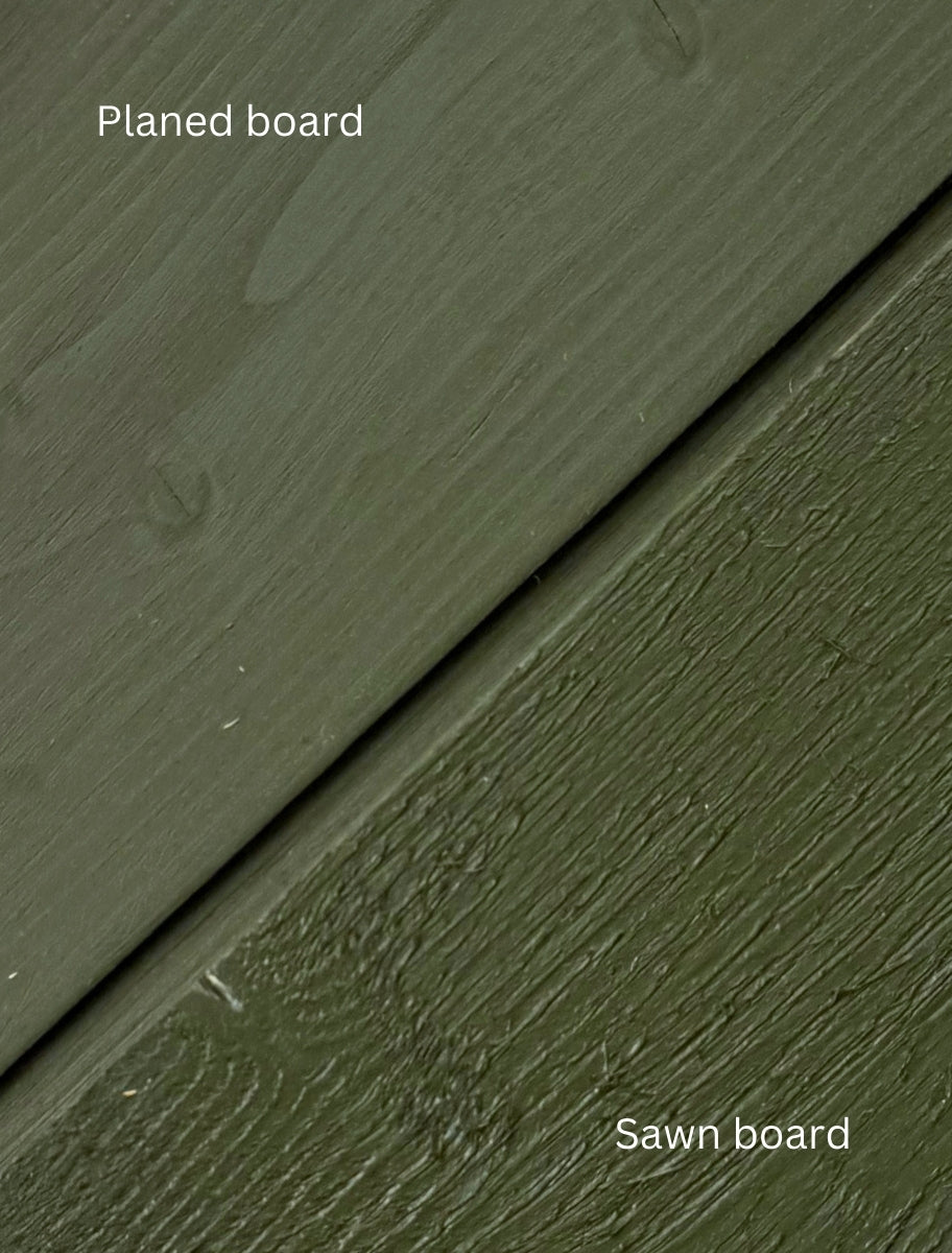 Comparison of planed board and sawn board painted with PainEco Linseed Oil Paint Forest green shade.