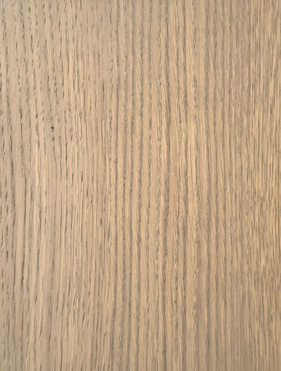 Close-up of a wooden surface finished with Paint Eco Tinted Hard Wax Oil Pebble shade