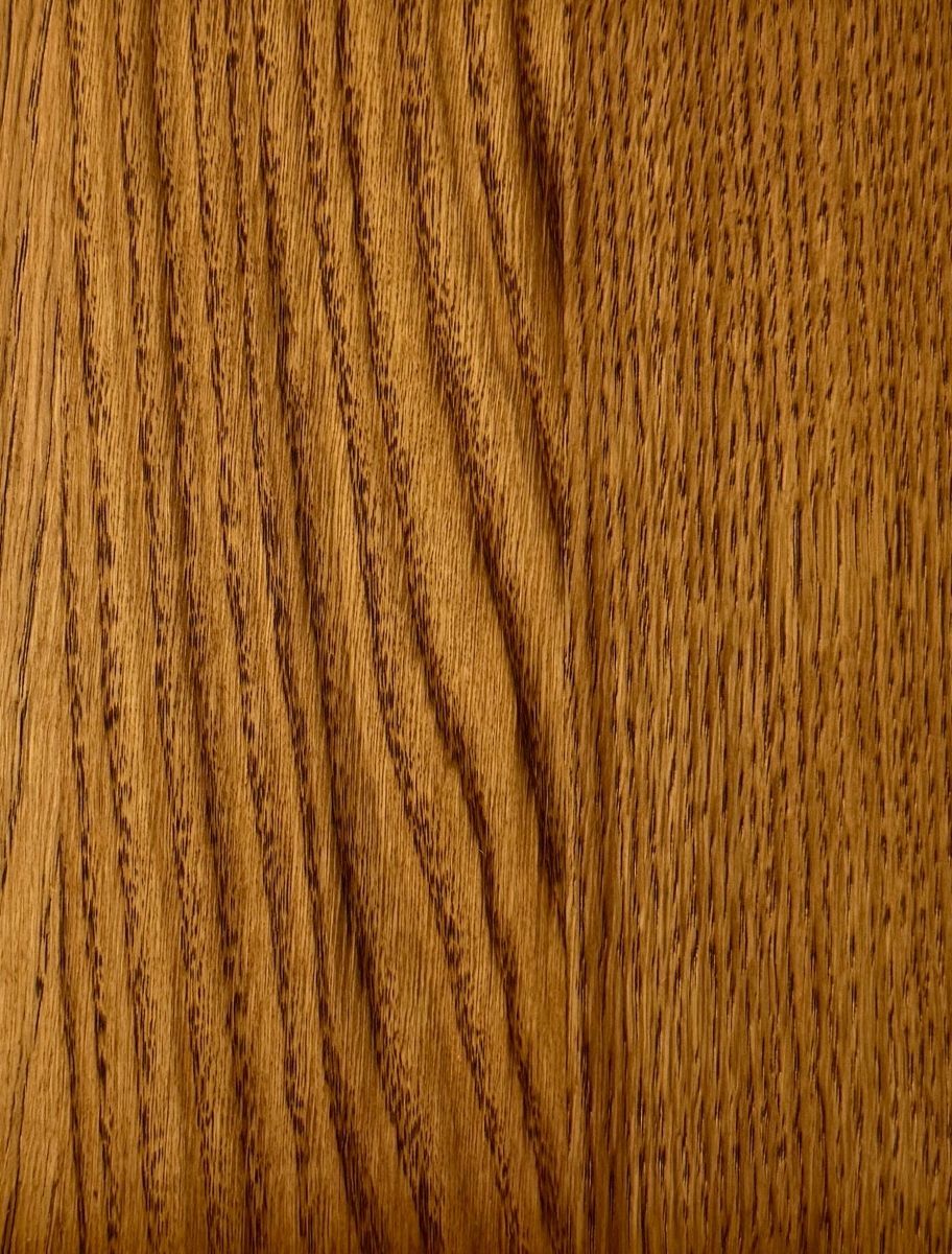 Close-up of a wooden surface finished with Paint Eco Tinted Hard Wax Oil Nut shade